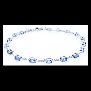Sterling Silver Bracelet 7-8.5”Long, Oval Cut Tanz CZ
=3.02ct